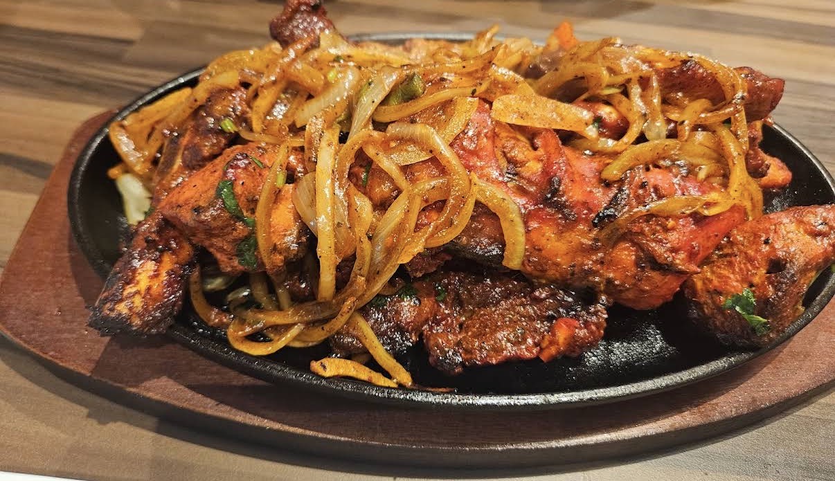 Chicken sizzler with onions
